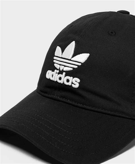 adidas hat with firm cap.